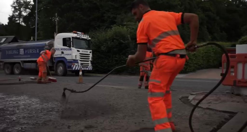 Road Surface Forecourt at Esso Garage, Peebles, Borders